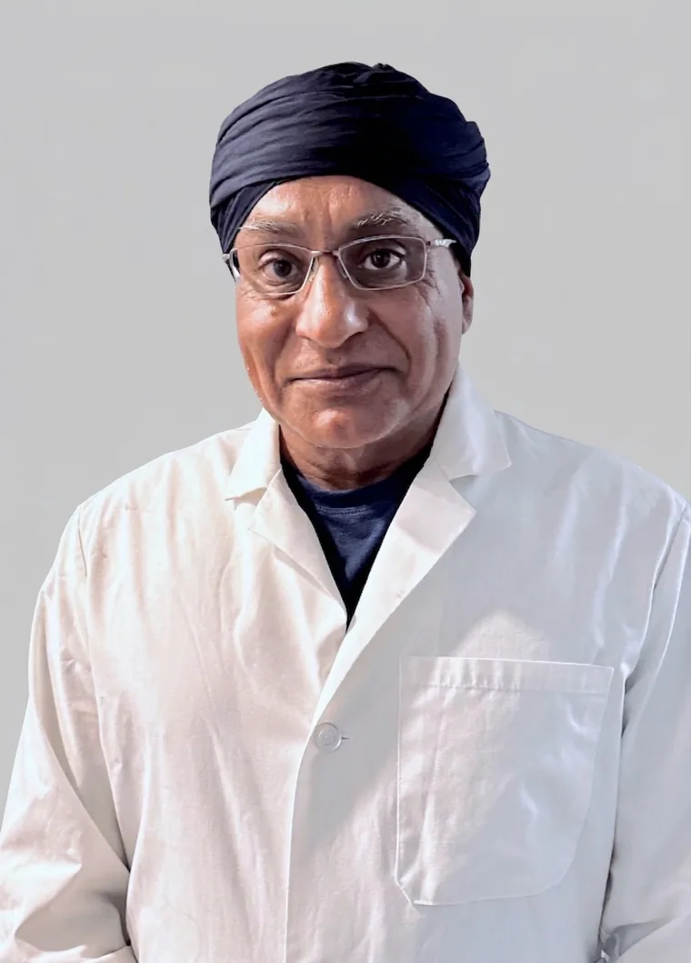 Dr. Gurpreet Singh Padda, MD, MBA, founder and medical director of Regen.MD in St. Louis, wearing a white clinical lab coat