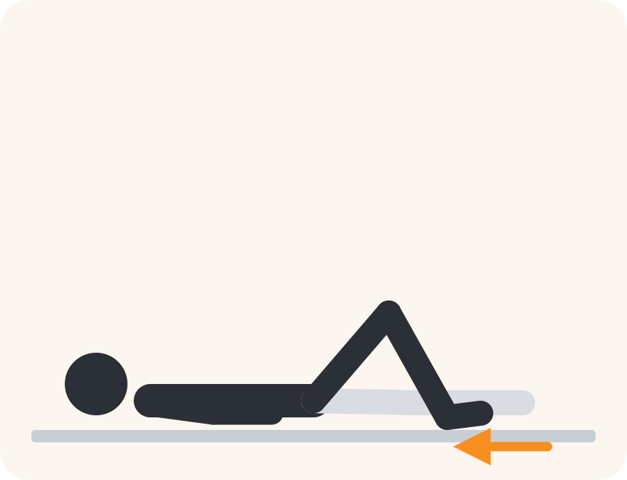 Line drawing of the heel slide exercise. The faded figure is the starting position, the dark figure is the finish, and the orange arrow shows the movement.